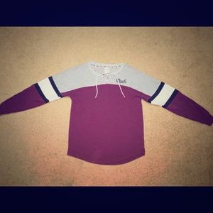 PINK long sleeve lace up tee.